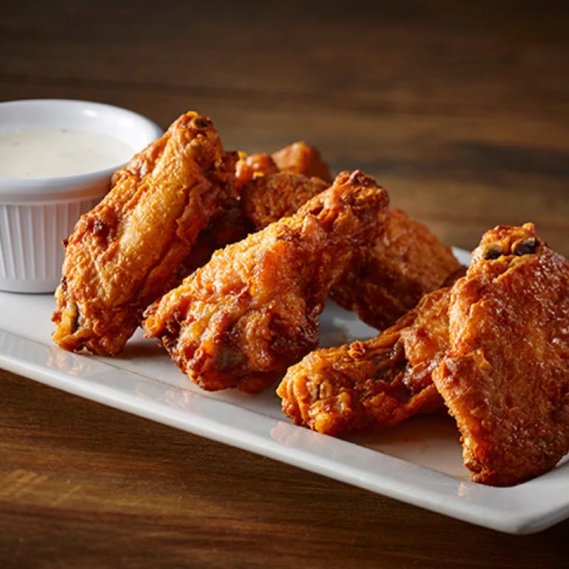 Ailes de poulet avec natures ou avec sauce Frank’s RedHot®