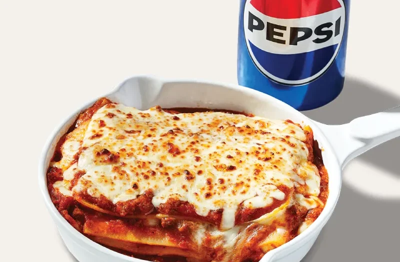 Solo value combo - lasagna, This solo value combo includes a regular portion of lasagna and a can of Pepsi® soda soft drink (355 ml)