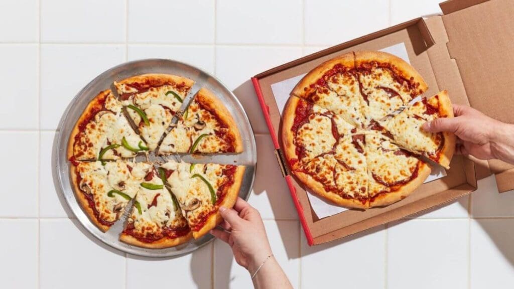 2 medium pizza in an open box for delivery