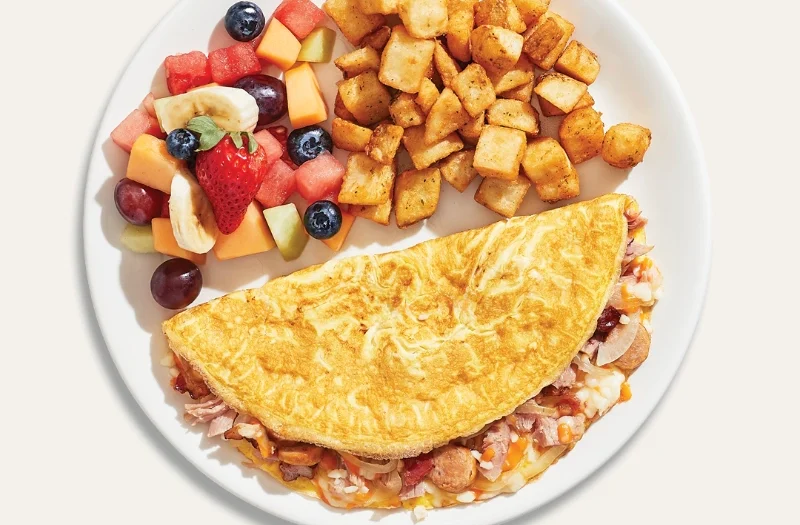 3 viandes avec jambon effiloché, bacon, saucisses, oignons et mélange de trois fromages
